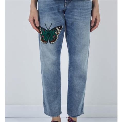 gucci butterfly jeans.